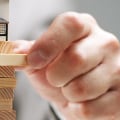 What are the four categories of insurance required by a business?
